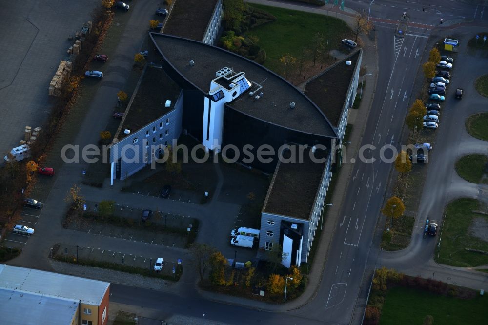 Neubrandenburg from above - Striking insurance and office buildings of the medical insurance company AOK. At the Alfred Lythall Street in Neubrandenburg in Mecklenburg-Western Pomerania