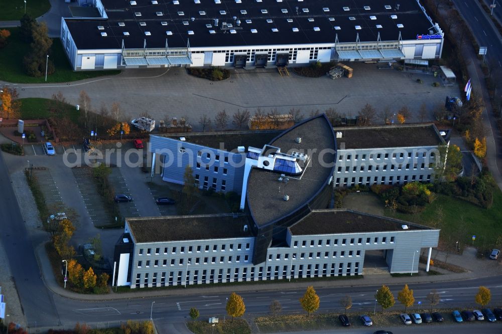 Neubrandenburg from the bird's eye view: Striking insurance and office buildings of the medical insurance company AOK. At the Alfred Lythall Street in Neubrandenburg in Mecklenburg-Western Pomerania