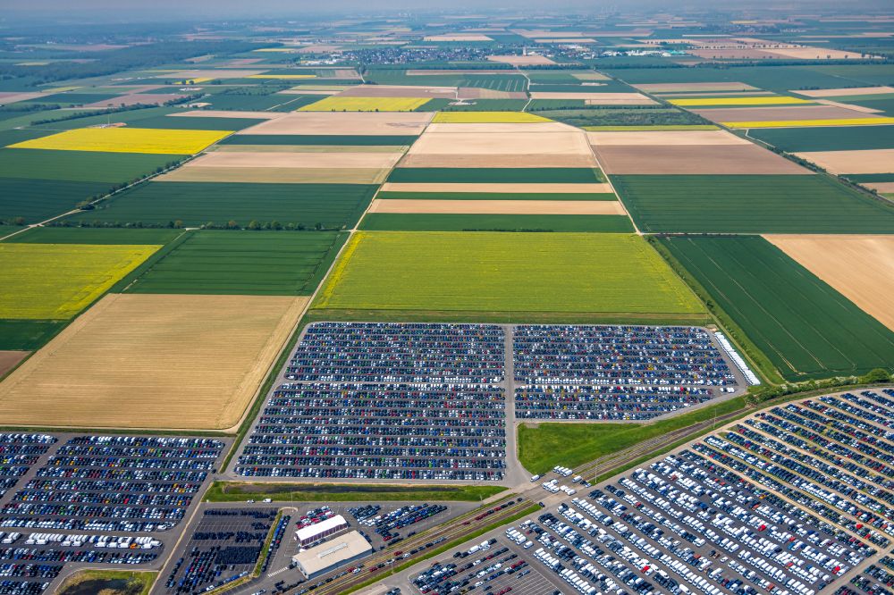 Zülpich from the bird's eye view: Of the building complex of the distribution center and logistics center for new cars and new vehicles on the premises of CAT Germany GmbH on the B56 road in the district of Geich in Zuelpich in the state of North Rhine-Westphalia, Germany