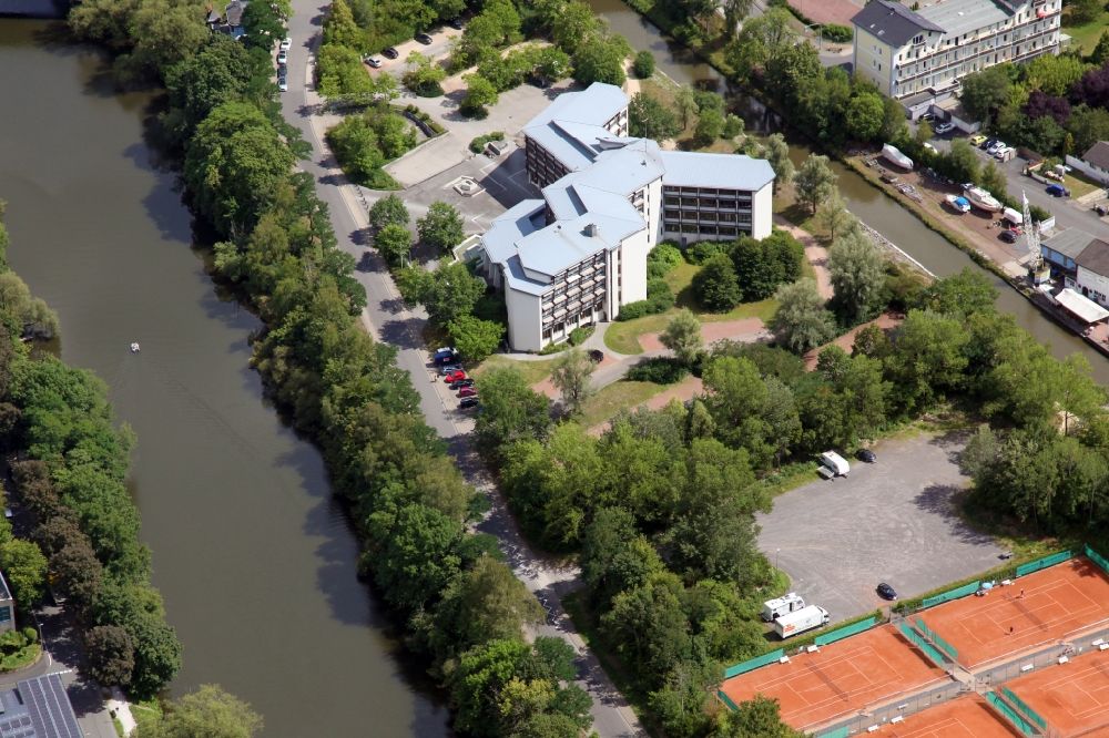 Bad Ems from the bird's eye view: Administrative building of the State Authority District administration Bad Ems in Bad Ems in the state Rhineland-Palatinate, Germany. It lies on the island of Silberau between the river Lahn and the side channel to the lock