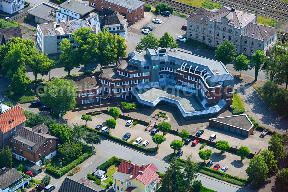 Holzminden from the bird's eye view: Office and administration buildings of the insurance company AOK in Holzminden in the state Lower Saxony, Germany