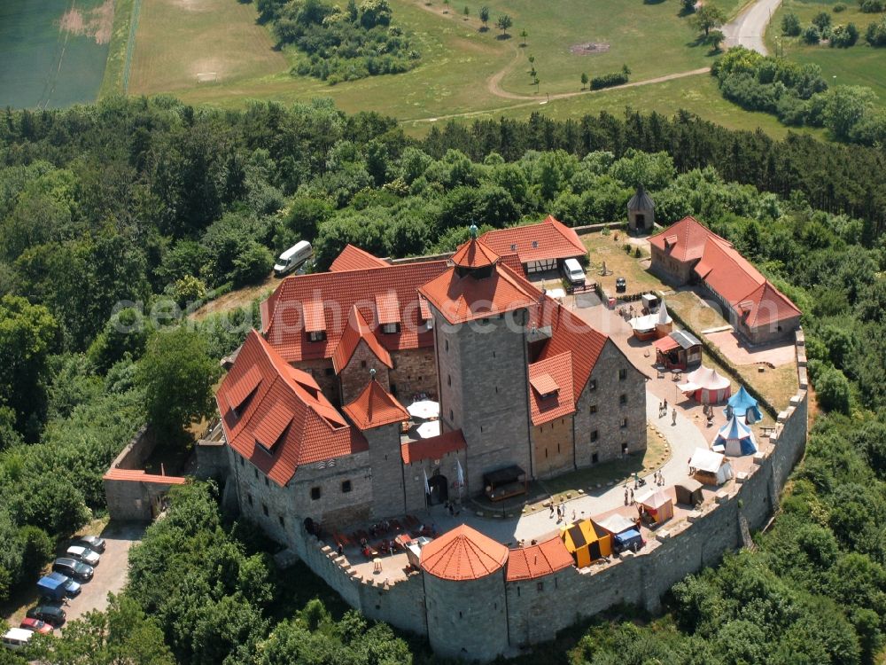Amt Wachsenburg from above - Castle Veste Wachsenburg in Amt Wachsenburg in the state Thuringia. The landmark is part of a group of castles in Thuringia. The borough is located in the background