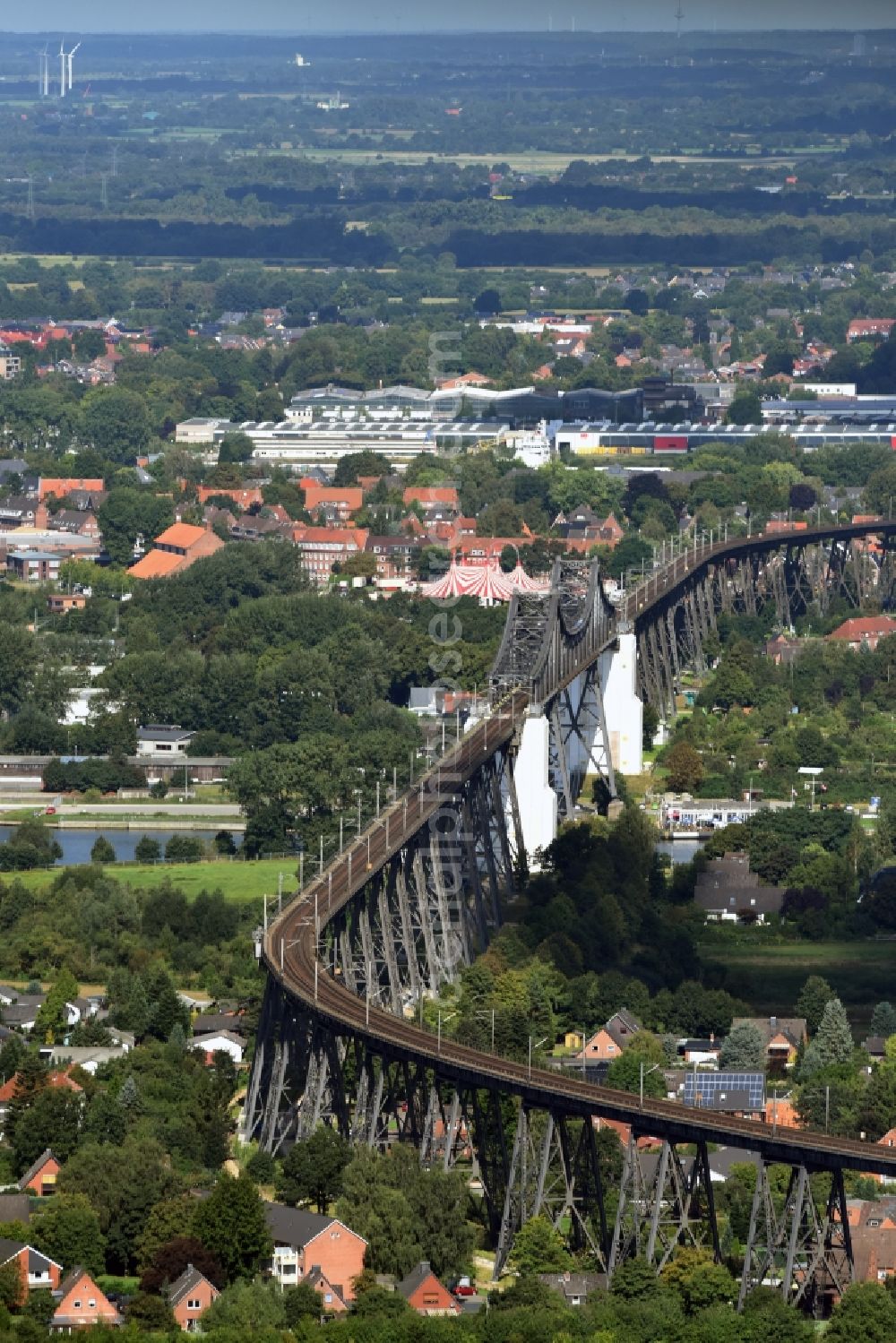 Osterrönfeld from above - Viaduct of the railway bridge structure to route the railway tracks in Osterroenfeld in the state Schleswig-Holstein