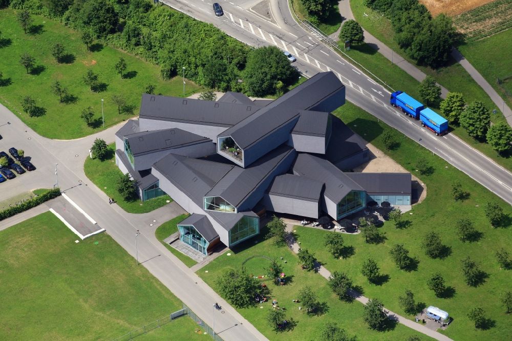 Aerial photograph Weil am Rhein - Building and production halls on the premises of the furniture manufacturer Vitra in Weil am Rhein in the state of Baden- Wuerttemberg form a unique ensemble of contemporary architecture
