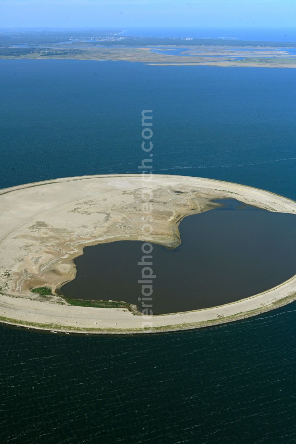 Swinemünde from above - Circular bird protection island and intended biotope of Polish Society for the Protection of Birds (OTOP) on the water surface of the Szczecin Lagoon in Swinoujscie in West Pomeranian Voivodeship, Poland
