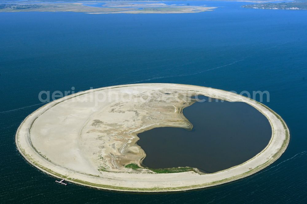 Swinemünde from the bird's eye view: Circular bird protection island and intended biotope of Polish Society for the Protection of Birds (OTOP) on the water surface of the Szczecin Lagoon in Swinoujscie in West Pomeranian Voivodeship, Poland