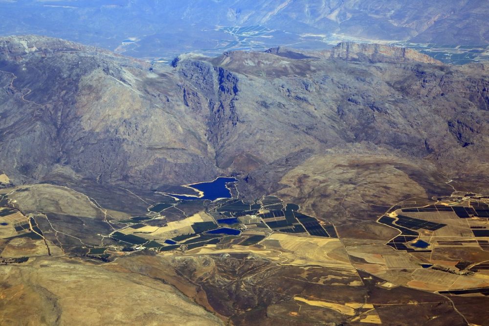Breede River DC from above - Agricultural landscape surrounded by mountains at the Lakenvlei Dam in Breede River DC in Western Cape, South Africa