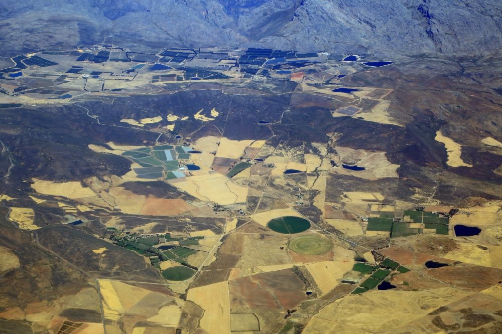 Aerial image Breede River DC - Agricultural landscape surrounded by mountains in Breede River DC in Western Cape, South Africa