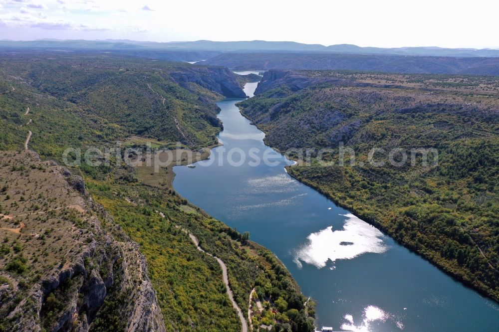 Aerial image Bogatic - Valley landscape surrounded by mountains in Bogatic on river krka in Sibensko-kninska zupanija, Croatia