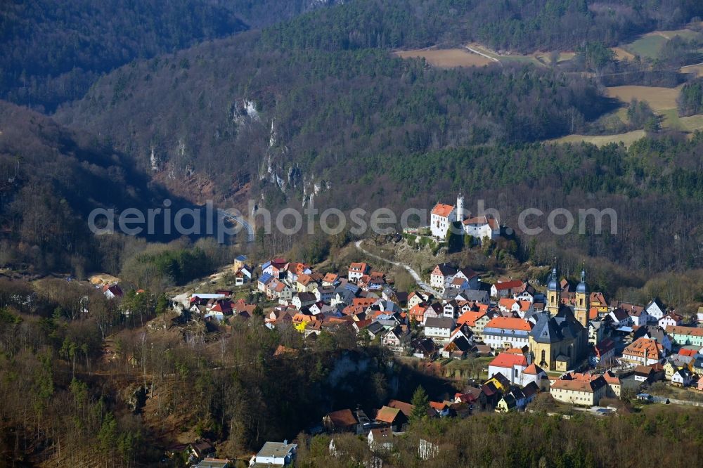 Aerial image Gößweinstein - Surrounded by forest and forest areas center of the streets and houses and residential areas in Goessweinstein at Fraenkische Schweiz in the state Bavaria, Germany