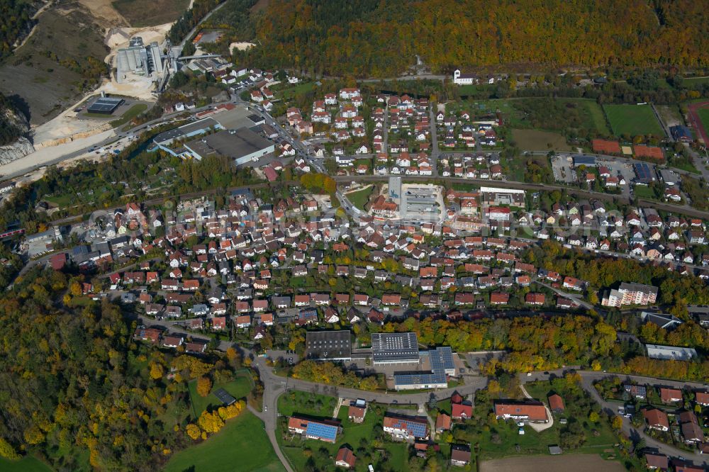 Blaustein from the bird's eye view: Surrounded by forest and forest areas center of the streets and houses and residential areas in Blaustein in the state Baden-Wuerttemberg, Germany