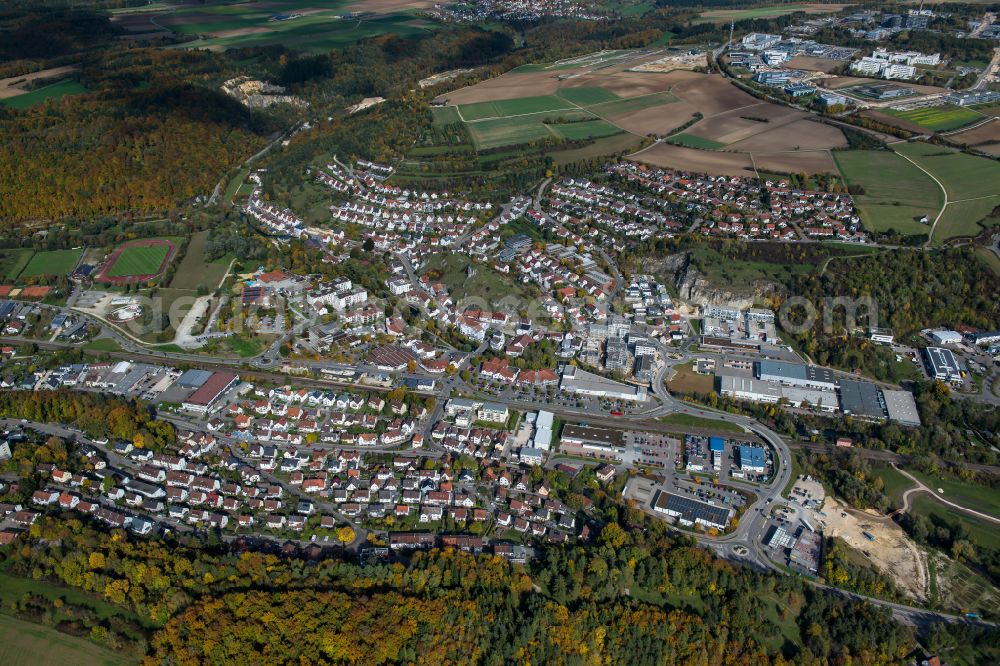 Aerial image Blaustein - Surrounded by forest and forest areas center of the streets and houses and residential areas in Blaustein in the state Baden-Wuerttemberg, Germany
