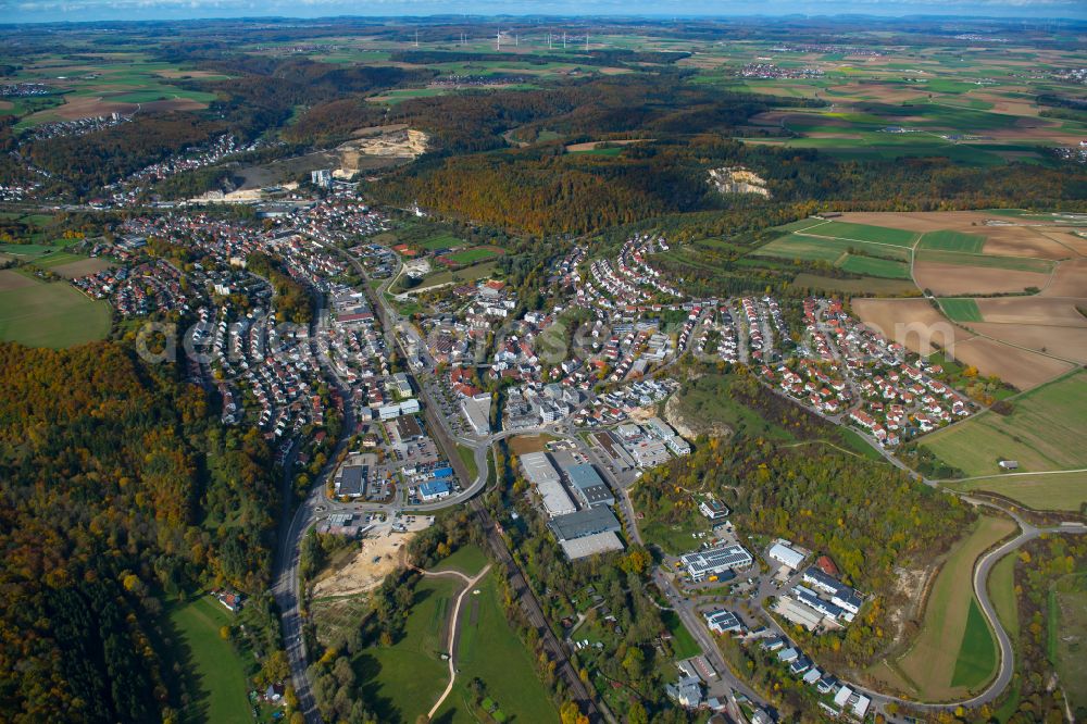 Aerial photograph Blaustein - Surrounded by forest and forest areas center of the streets and houses and residential areas in Blaustein in the state Baden-Wuerttemberg, Germany