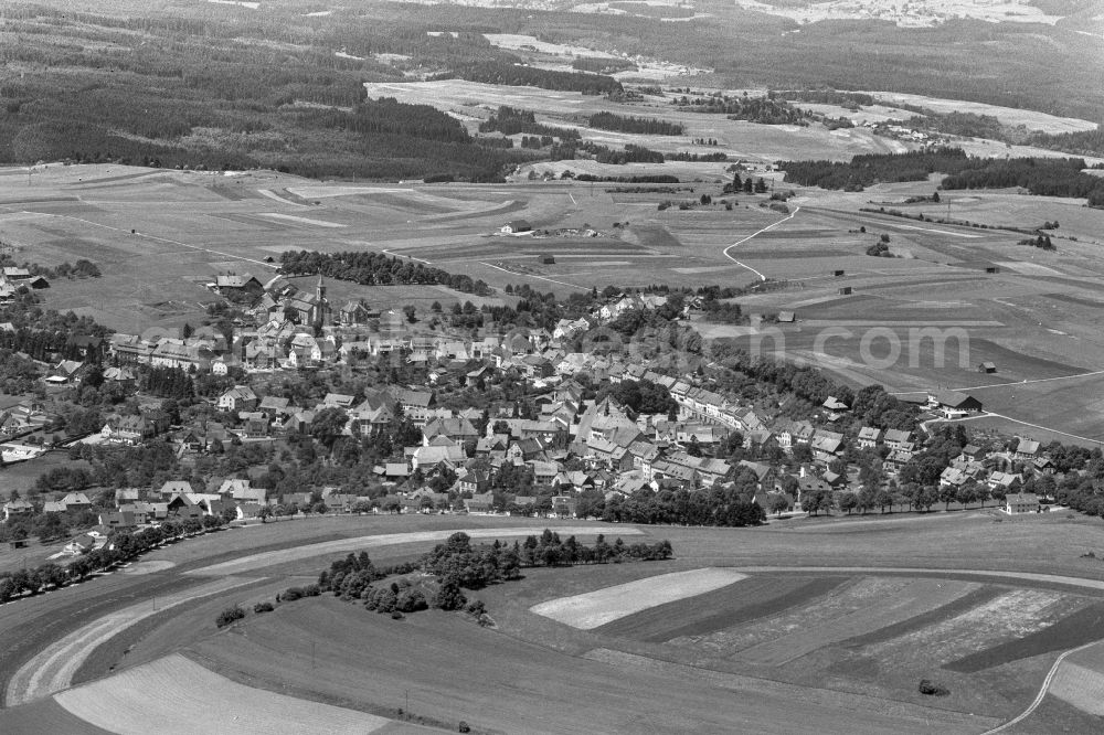 Aerial photograph Bonndorf im Schwarzwald - Surrounded by forest and forest areas center of the streets and houses and residential areas in Bonndorf in southern Black Forest in the state Baden-Wuerttemberg, Germany