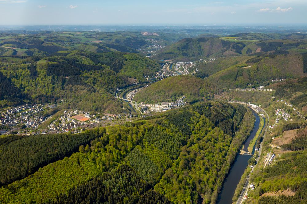 Buchholz from the bird's eye view: Surrounded by forest and forest areas center of the streets and houses and residential areas in Buchholz in the state North Rhine-Westphalia, Germany