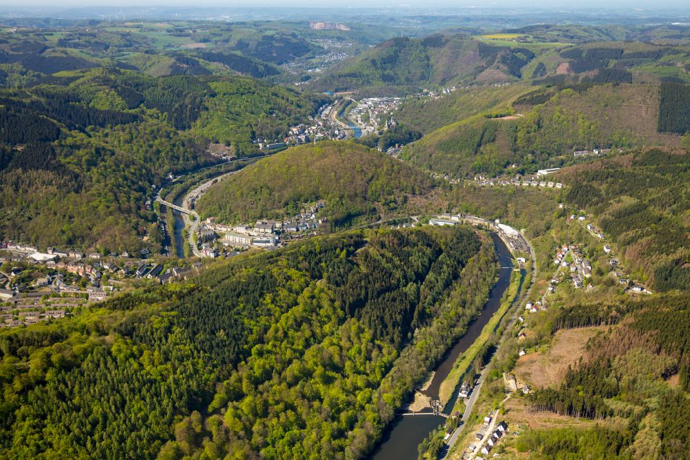 Buchholz from the bird's eye view: Surrounded by forest and forest areas center of the streets and houses and residential areas in Buchholz in the state North Rhine-Westphalia, Germany