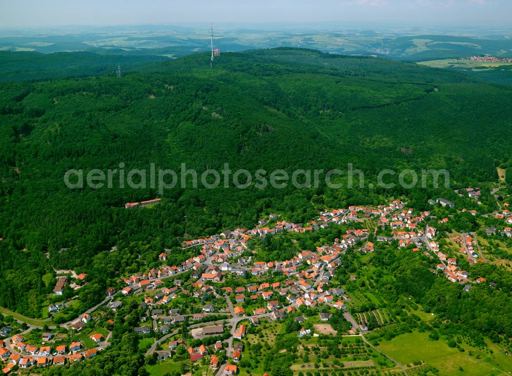 Dannenfels from above - Surrounded by forest and forest areas center of the streets and houses and residential areas in Dannenfels in the state Rhineland-Palatinate, Germany