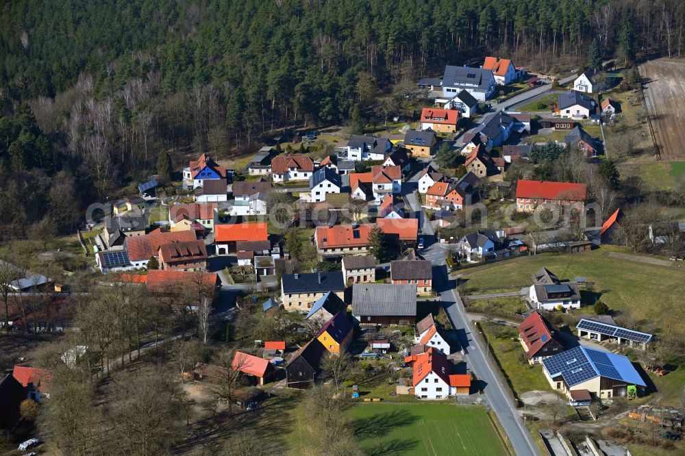 Dörnhof from above - Surrounded by forest and forest areas center of the streets and houses and residential areas in Doernhof in the state Bavaria, Germany