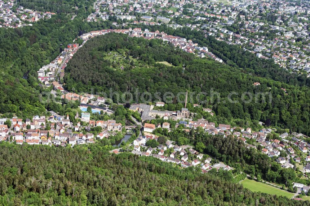 Aerial image Pforzheim - Surrounded by forest and forest areas center of the streets and houses and residential areas with the ruins of the buildings and halls of the former Weissenstein paper factory in Pforzheim in the state Baden-Wuerttemberg, Germany