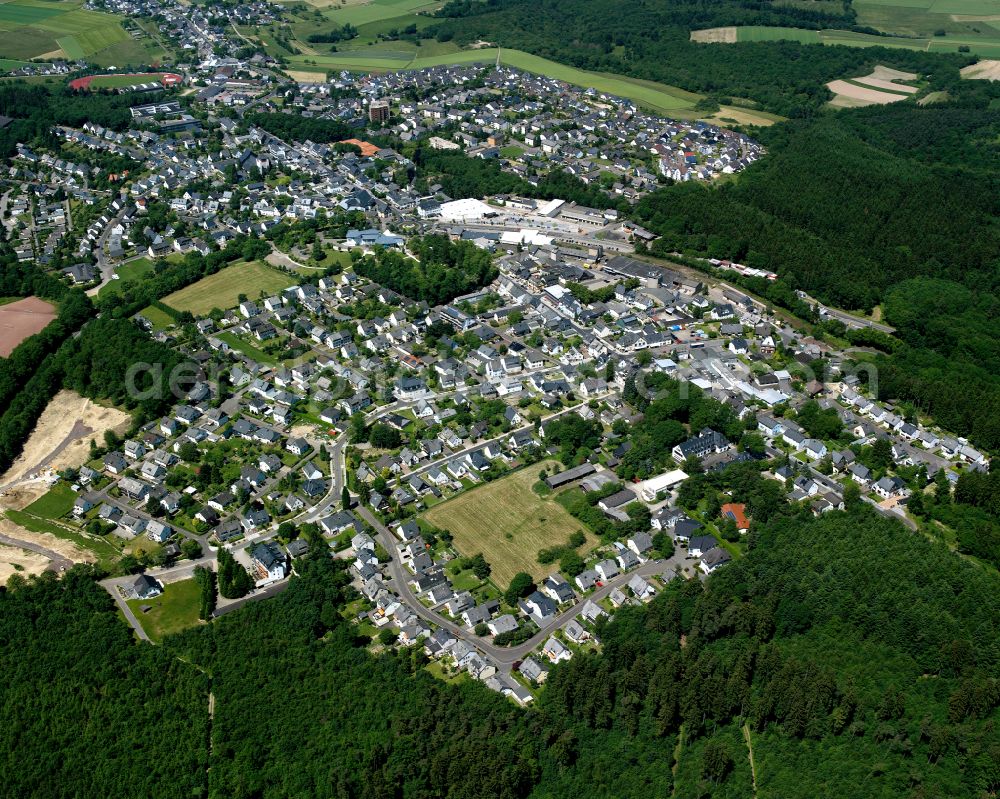 Aerial image Emmelshausen - Surrounded by forest and forest areas center of the streets and houses and residential areas in Emmelshausen in the state Rhineland-Palatinate, Germany