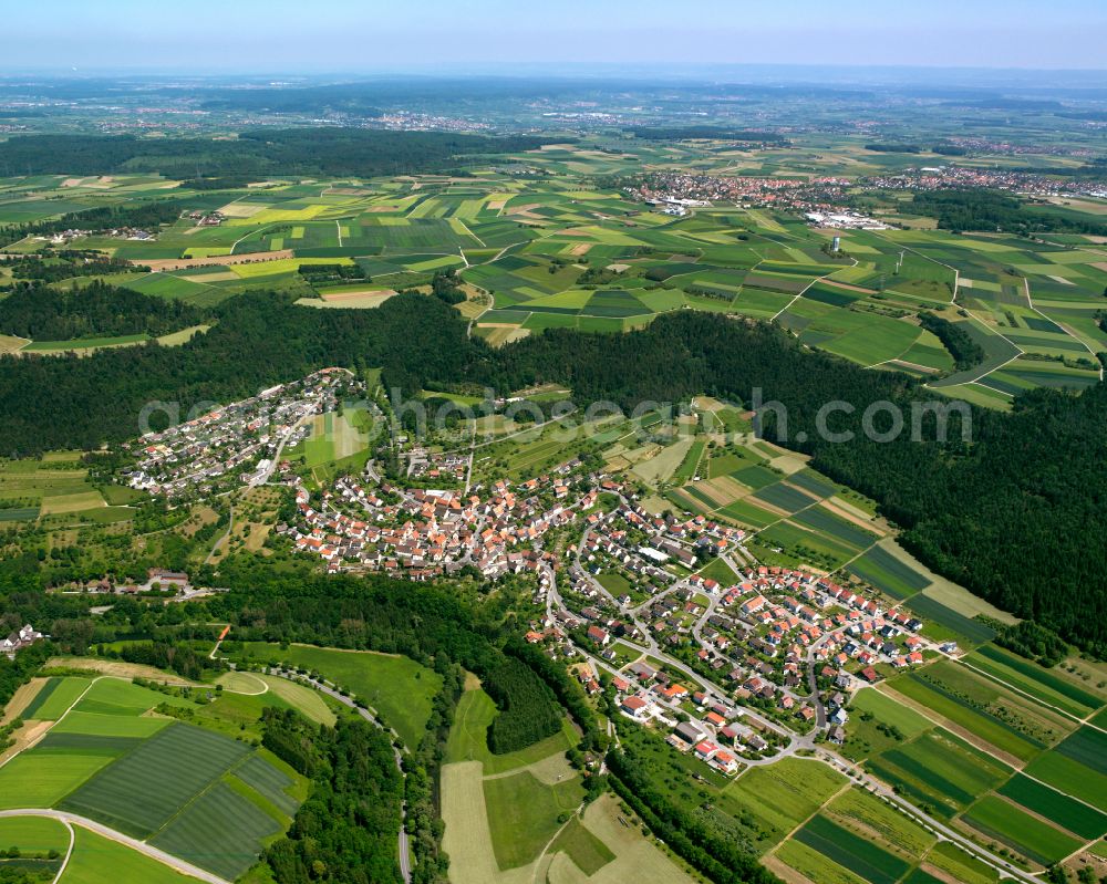 Aerial image Emmingen - Surrounded by forest and forest areas center of the streets and houses and residential areas in Emmingen in the state Baden-Wuerttemberg, Germany