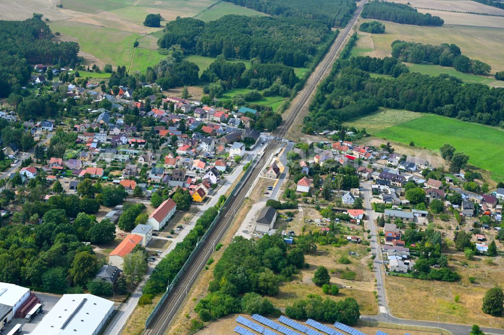 Grüneberg from the bird's eye view: Surrounded by forest and forest areas center of the streets and houses and residential areas in Grueneberg Loewenberger Land in the state Brandenburg, Germany