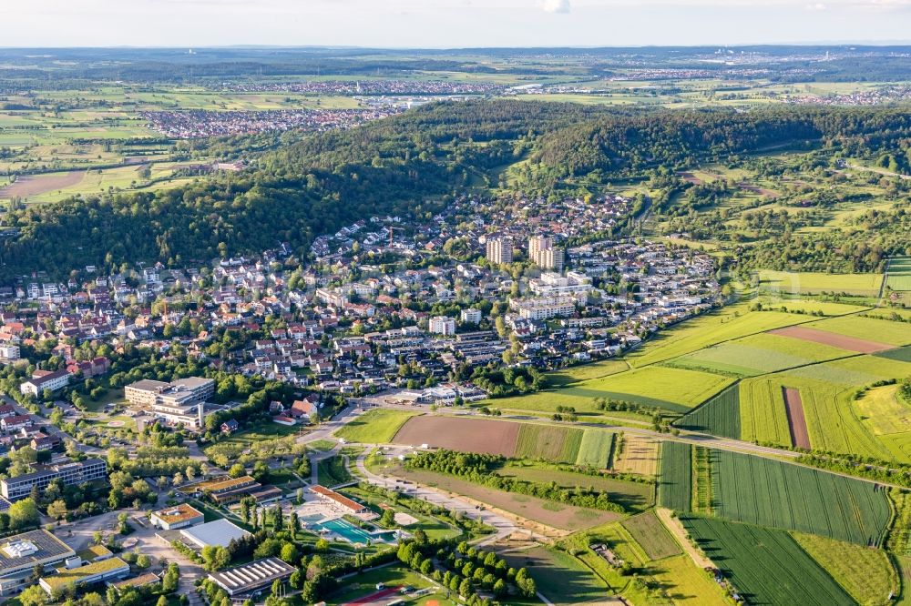 Herrenberg from the bird's eye view: Surrounded by forest and forest areas center of the streets and houses and residential areas in Herrenberg in the state Baden-Wurttemberg, Germany