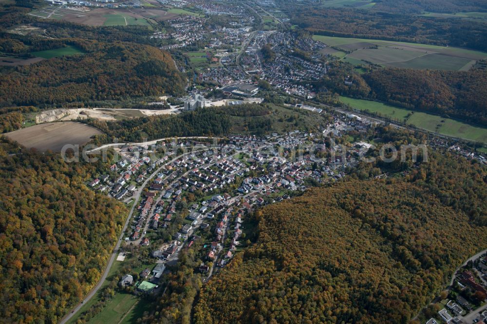 Aerial image Herrlingen - Surrounded by forest and forest areas center of the streets and houses and residential areas in Herrlingen in the state Baden-Wuerttemberg, Germany