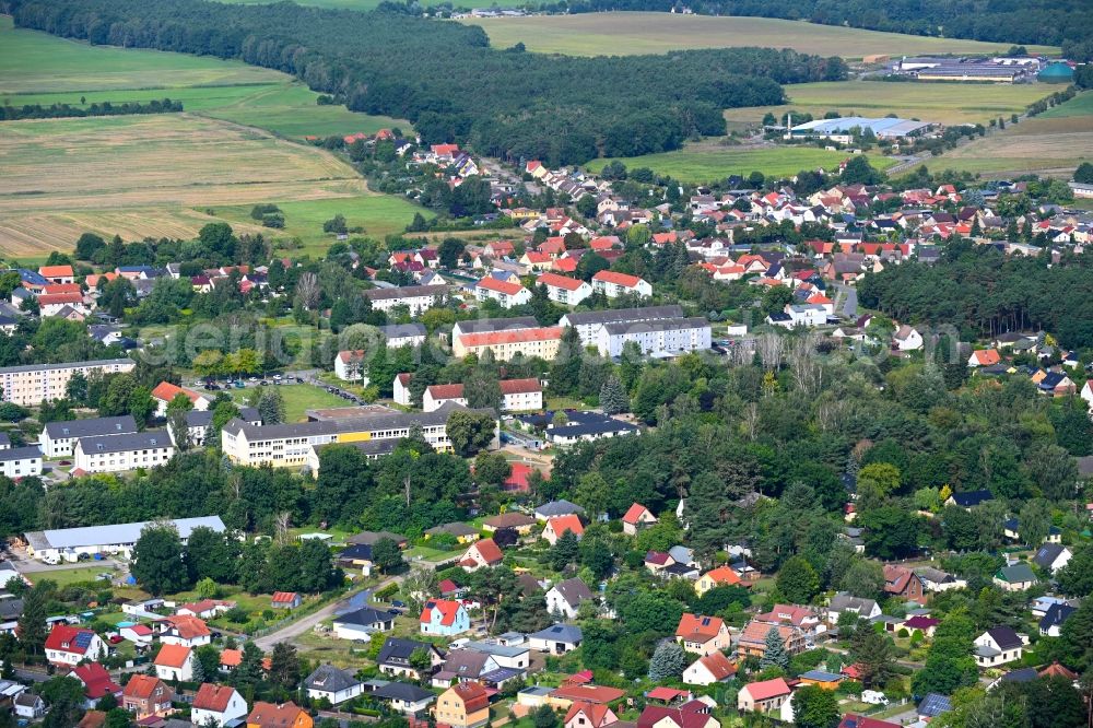 Klosterfelde from above - Surrounded by forest and forest areas center of the streets and houses and residential areas in Klosterfelde in the state Brandenburg, Germany