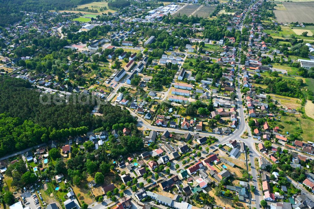 Klosterfelde from the bird's eye view: Surrounded by forest and forest areas center of the streets and houses and residential areas in Klosterfelde in the state Brandenburg, Germany