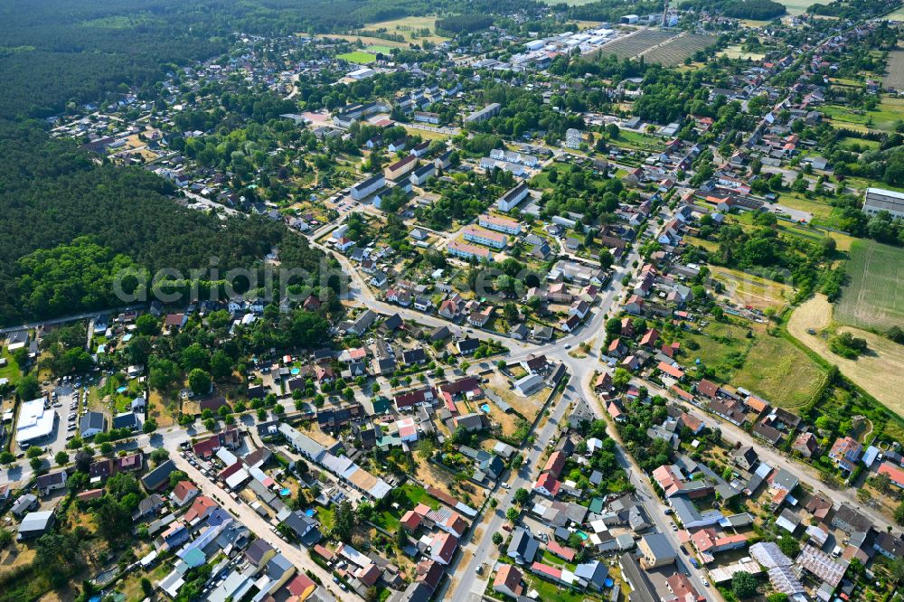 Aerial image Klosterfelde - Surrounded by forest and forest areas center of the streets and houses and residential areas in Klosterfelde in the state Brandenburg, Germany