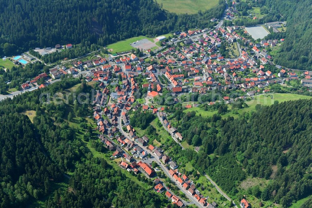 Aerial photograph Lautenthal - Surrounded by forest and forest areas center of the streets and houses and residential areas in Lautenthal in the state Lower Saxony, Germany
