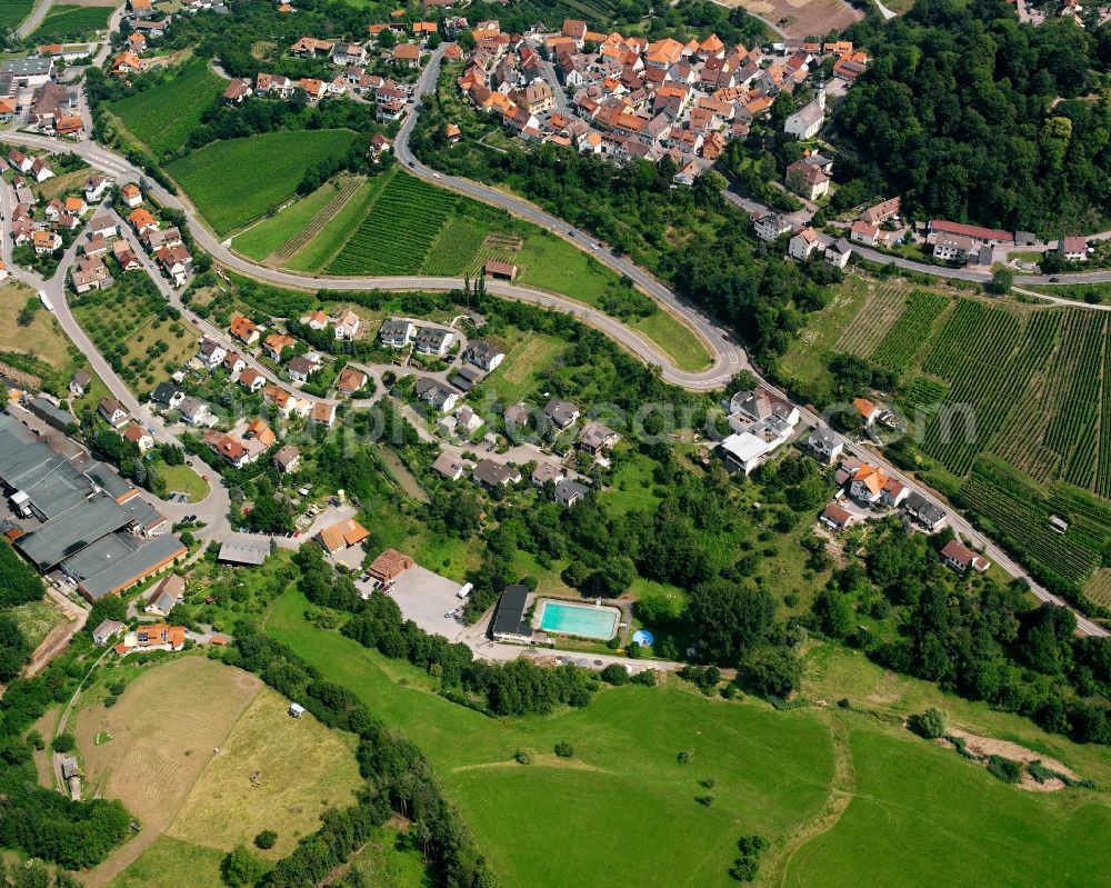 Löwenstein from the bird's eye view: Surrounded by forest and forest areas center of the streets and houses and residential areas in Löwenstein in the state Baden-Wuerttemberg, Germany