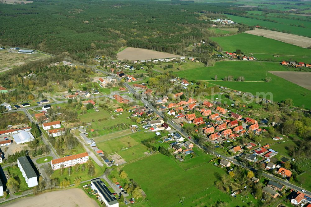 Aerial image Malliß - Surrounded by forest and forest areas center of the streets and houses and residential areas in Malliss in the state Mecklenburg - Western Pomerania, Germany