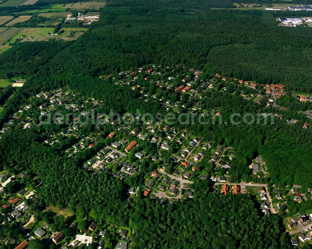 Aerial image Mölln - Surrounded by forest and forest areas center of the streets and houses and residential areas in Mölln in the state Schleswig-Holstein, Germany