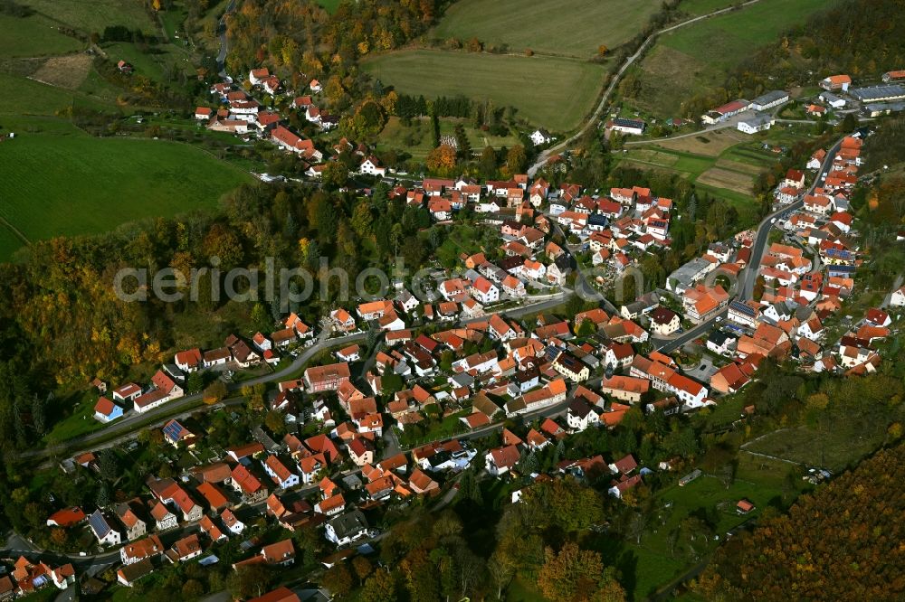 Aerial photograph Nazza - Surrounded by forest and forest areas center of the streets and houses and residential areas in Nazza in the state Thuringia, Germany