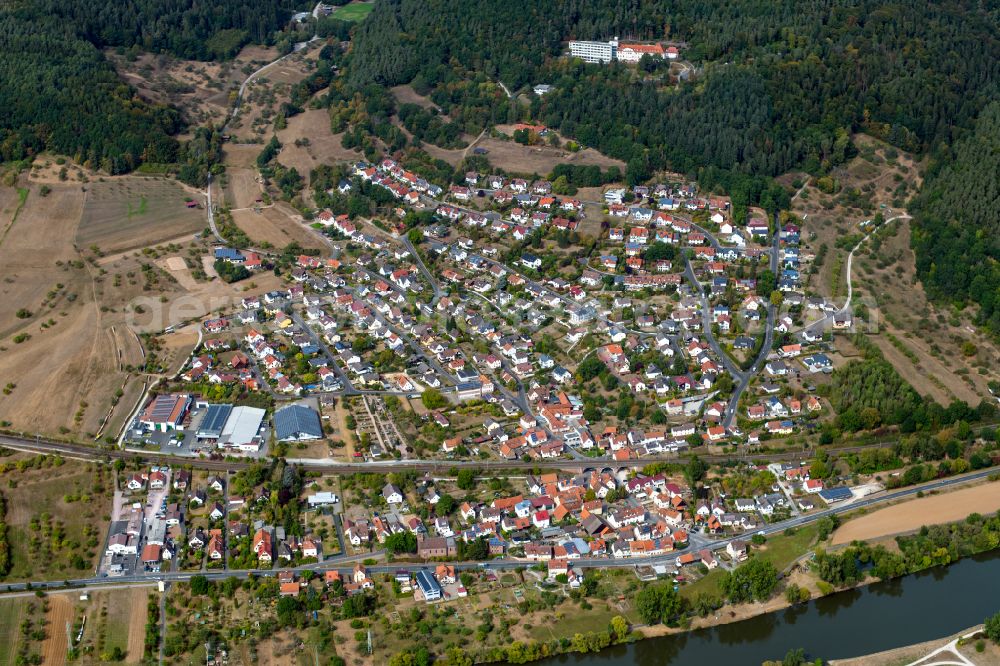 Aerial photograph Sackenbach - Surrounded by forest and forest areas center of the streets and houses and residential areas in Sackenbach in the state Bavaria, Germany