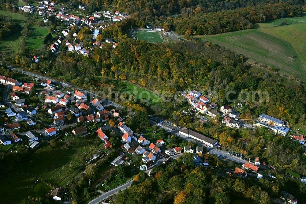 Sankt Wendel from the bird's eye view: Surrounded by forest and forest areas center of the streets and houses and residential areas in Sankt Wendel in the state Saarland, Germany