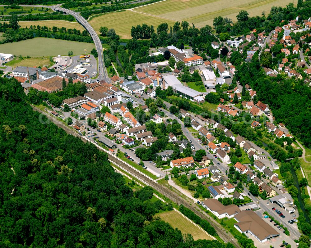 Aerial image Sickenhausen - Surrounded by forest and forest areas center of the streets and houses and residential areas in Sickenhausen in the state Baden-Wuerttemberg, Germany