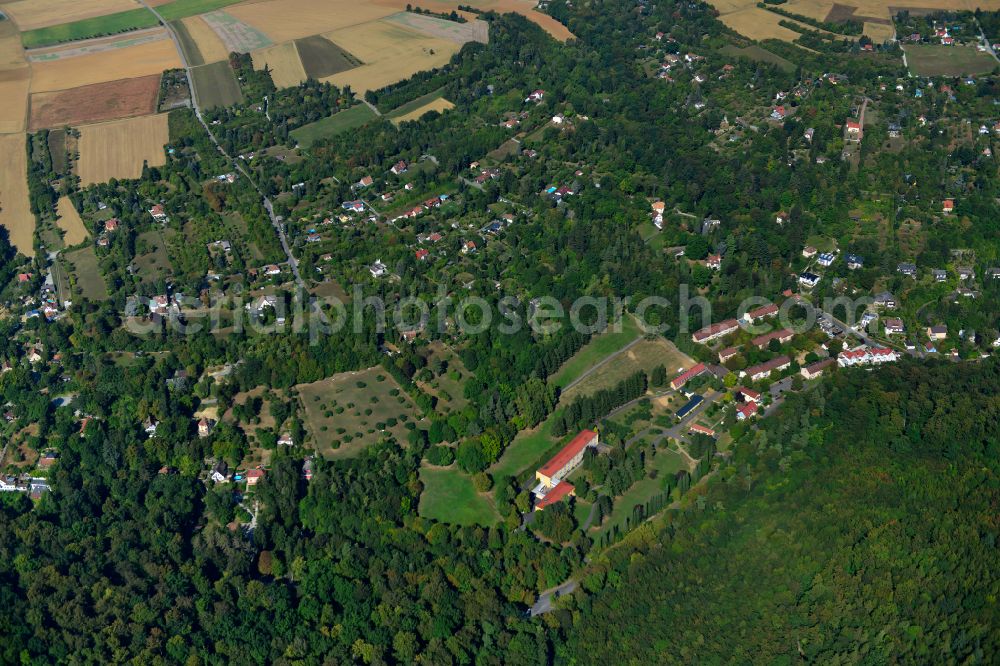 Aerial image Steinbachtal - Surrounded by forest and forest areas center of the streets and houses and residential areas in Steinbachtal in the state Bavaria, Germany