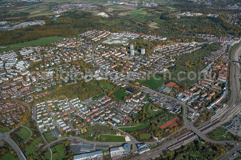 Thalfingen from the bird's eye view: Surrounded by forest and forest areas center of the streets and houses and residential areas in Thalfingen in the state Baden-Wuerttemberg, Germany