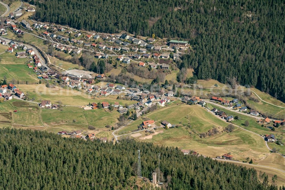 Tonbach from above - Surrounded by forest and forest areas center of the streets and houses and residential areas in Tonbach in the state Baden-Wuerttemberg, Germany