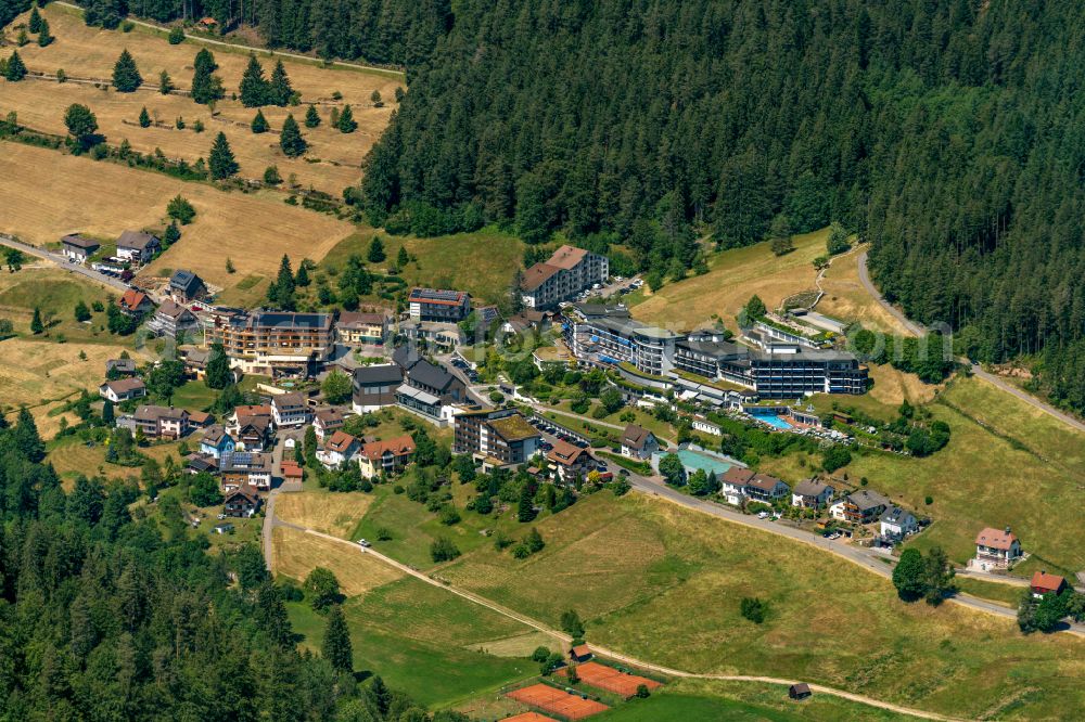Aerial photograph Tonbach - Surrounded by forest and forest areas center of the streets and houses and residential areas in Tonbach in the state Baden-Wuerttemberg, Germany