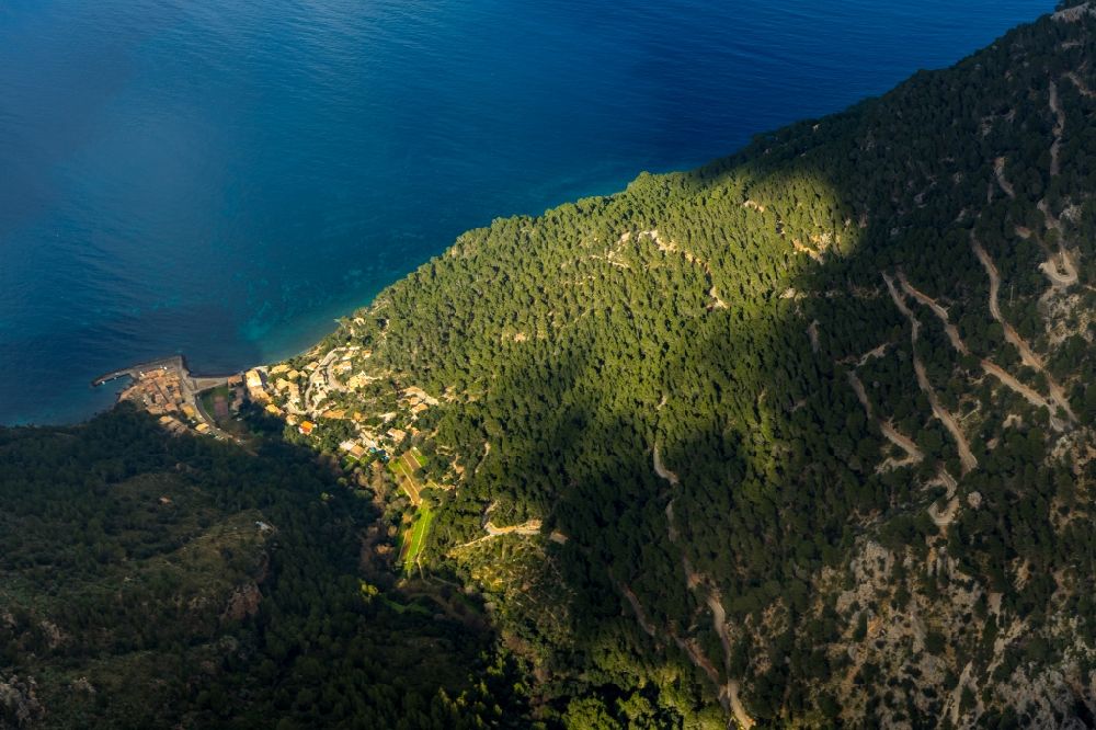 Aerial photograph Valldemossa - Surrounded by forest and forest areas center of the streets and houses and residential areas in Valldemossa in Balearic island of Mallorca, Spain