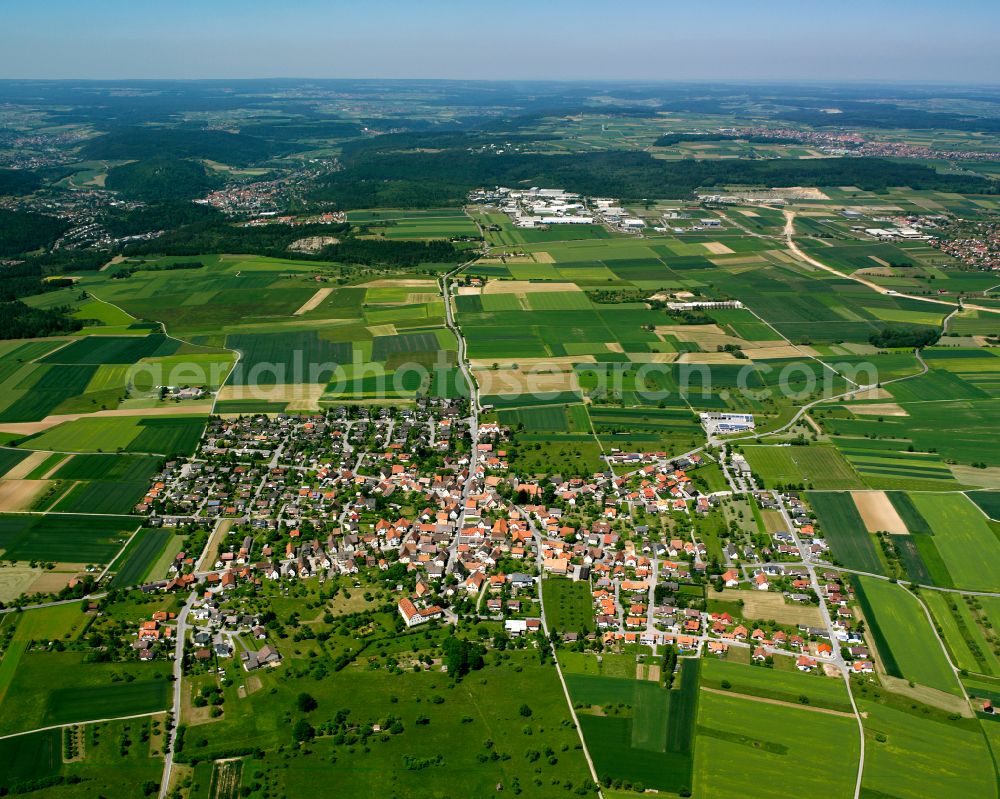 Aerial photograph Vollmaringen - Surrounded by forest and forest areas center of the streets and houses and residential areas in Vollmaringen in the state Baden-Wuerttemberg, Germany