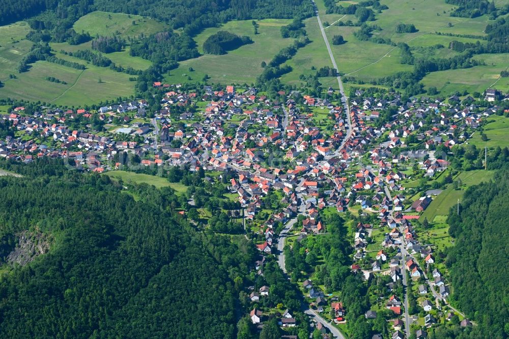 Aerial image Wolfshagen im Harz - Surrounded by forest and forest areas center of the streets and houses and residential areas in Wolfshagen im Harz in the state Lower Saxony, Germany