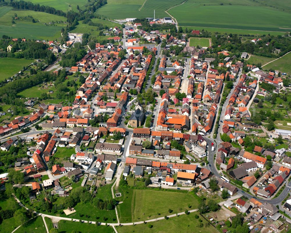 Hasselfelde from the bird's eye view: Urban area with outskirts and inner city area surrounded by woodland and forest areas in Hasselfelde in the state Saxony-Anhalt, Germany