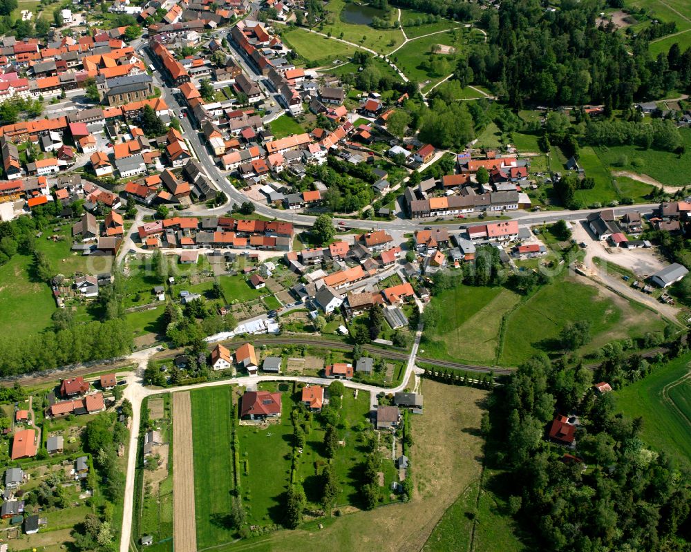 Aerial image Hasselfelde - Urban area with outskirts and inner city area surrounded by woodland and forest areas in Hasselfelde in the state Saxony-Anhalt, Germany