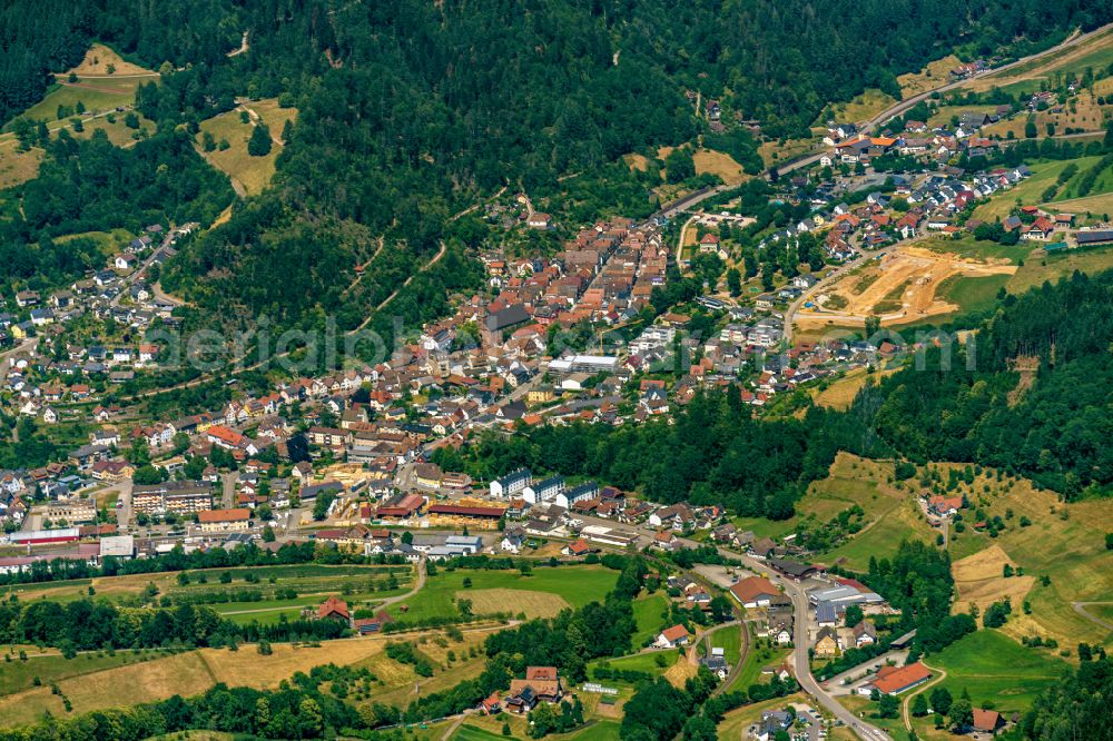 Oppenau from the bird's eye view: Urban area with outskirts and inner city area surrounded by woodland and forest areas in Oppenau in the state Baden-Wuerttemberg, Germany