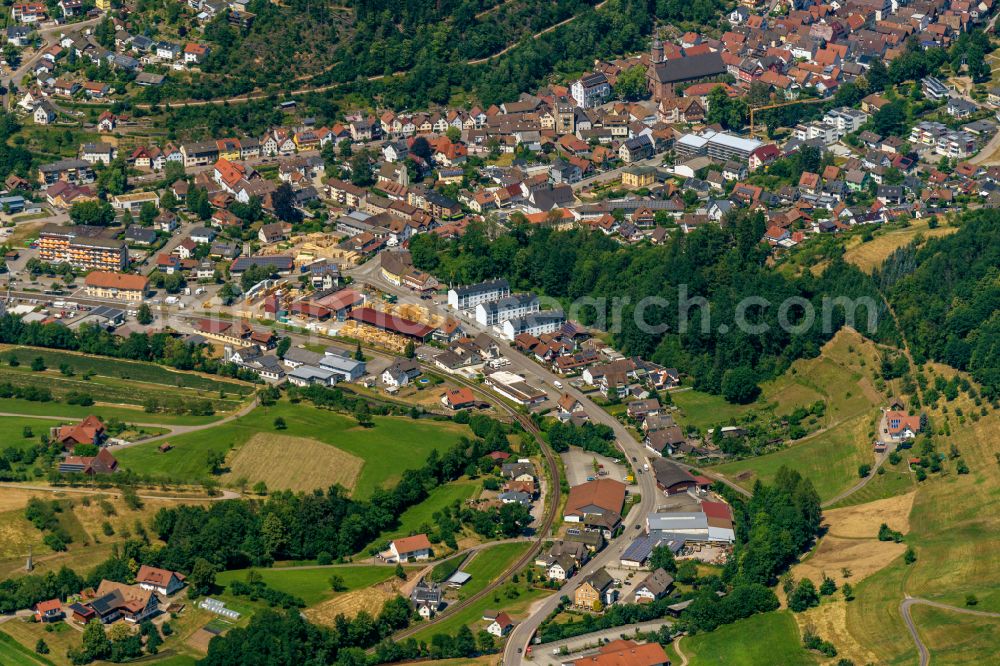 Aerial image Oppenau - Urban area with outskirts and inner city area surrounded by woodland and forest areas in Oppenau in the state Baden-Wuerttemberg, Germany